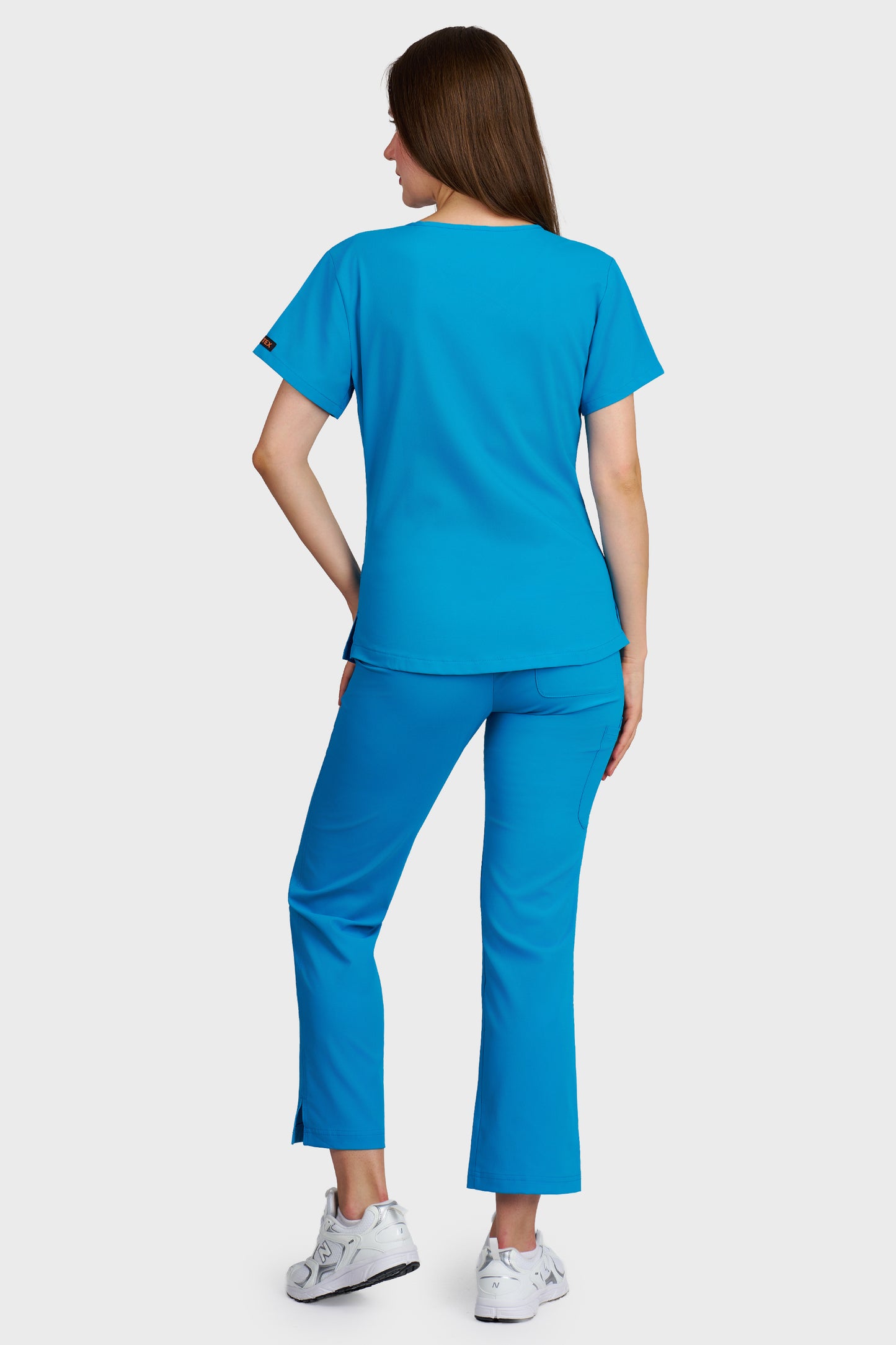 Costum medical femei turquoise - bluza medicala Carmen si pantaloni Violeta, vedere din spate - AKITEX