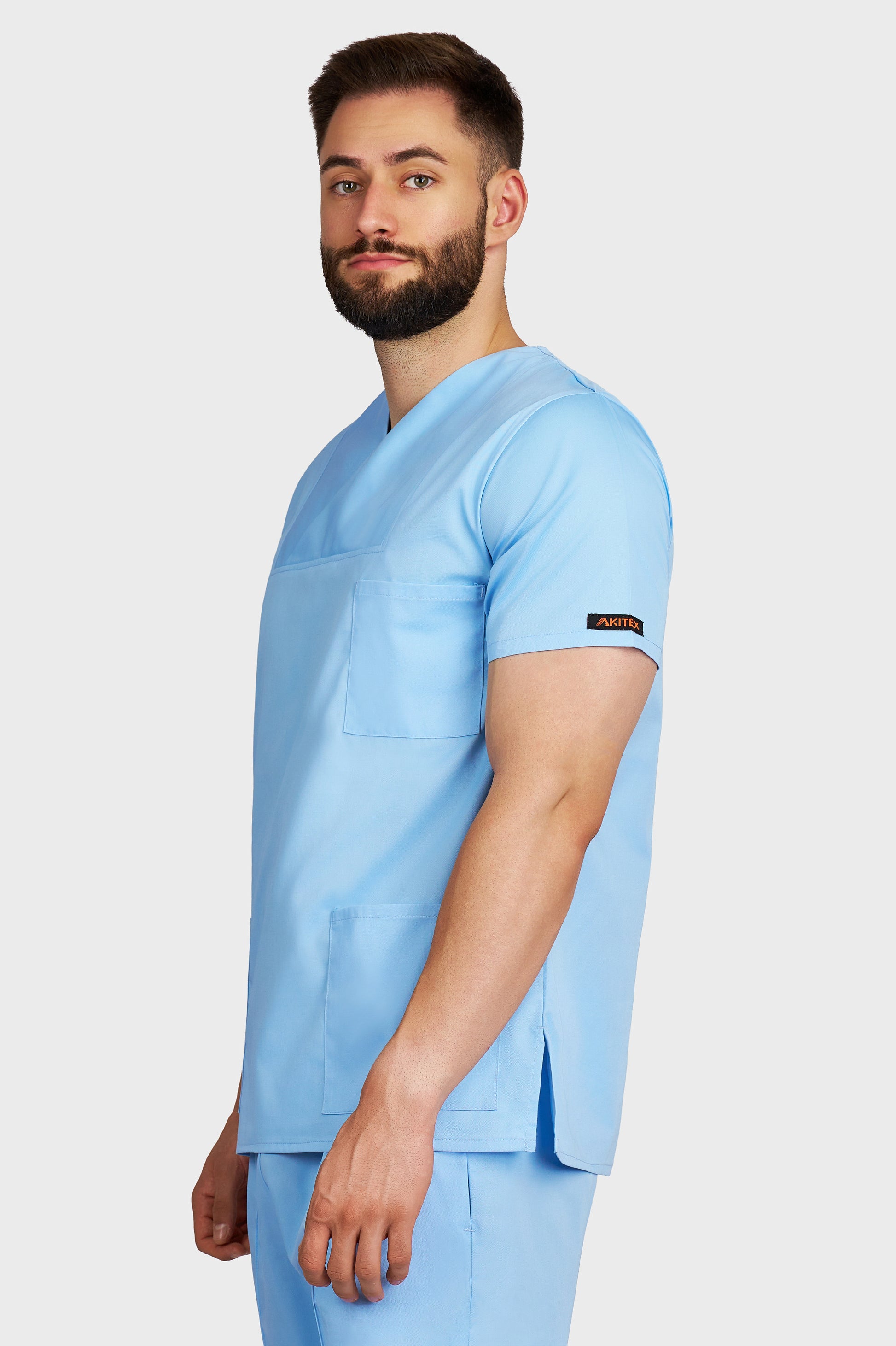 Bluza medicala barbati Victoria bleu deschis - vedere laterala - AKITEX