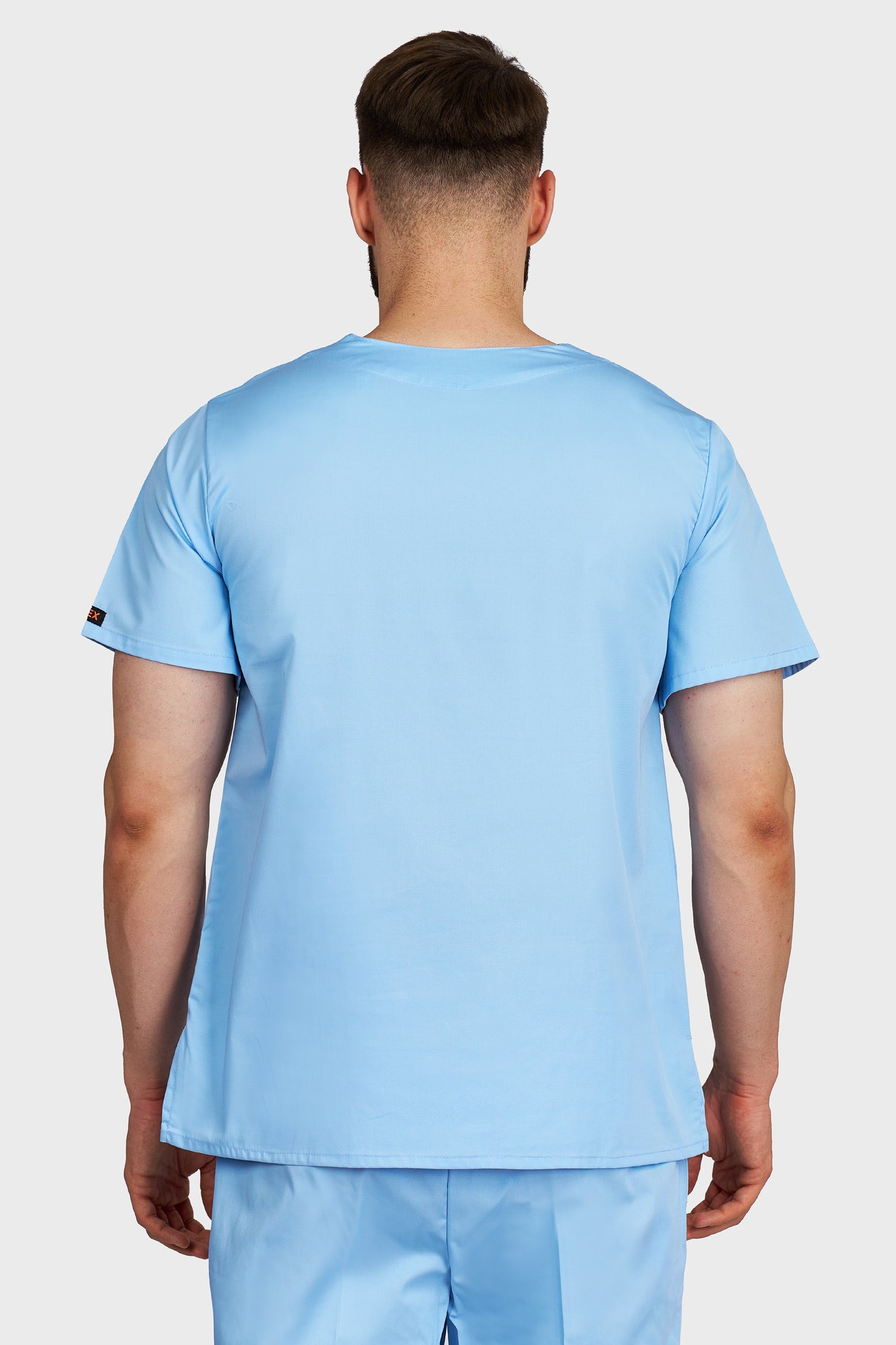 Bluza medicala barbati Victoria bleu deschis - vedere din spate - AKITEX
