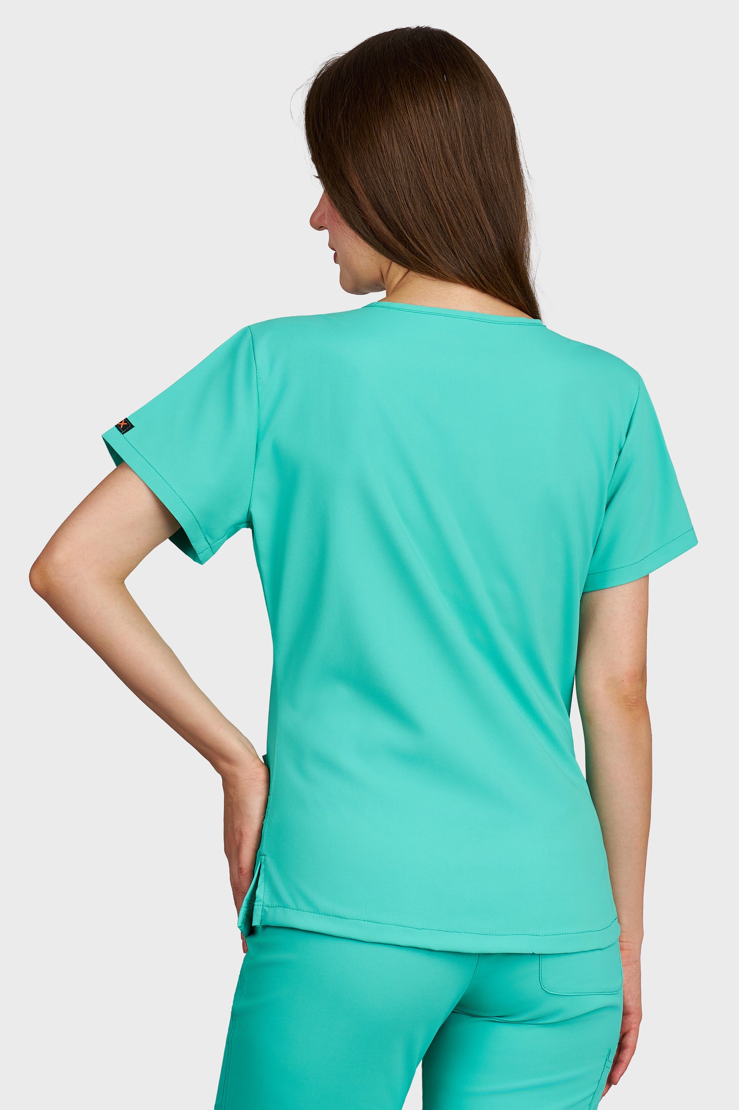 Bluza medicala femei Carmen menta stretch - vedere din spate - AKITEX