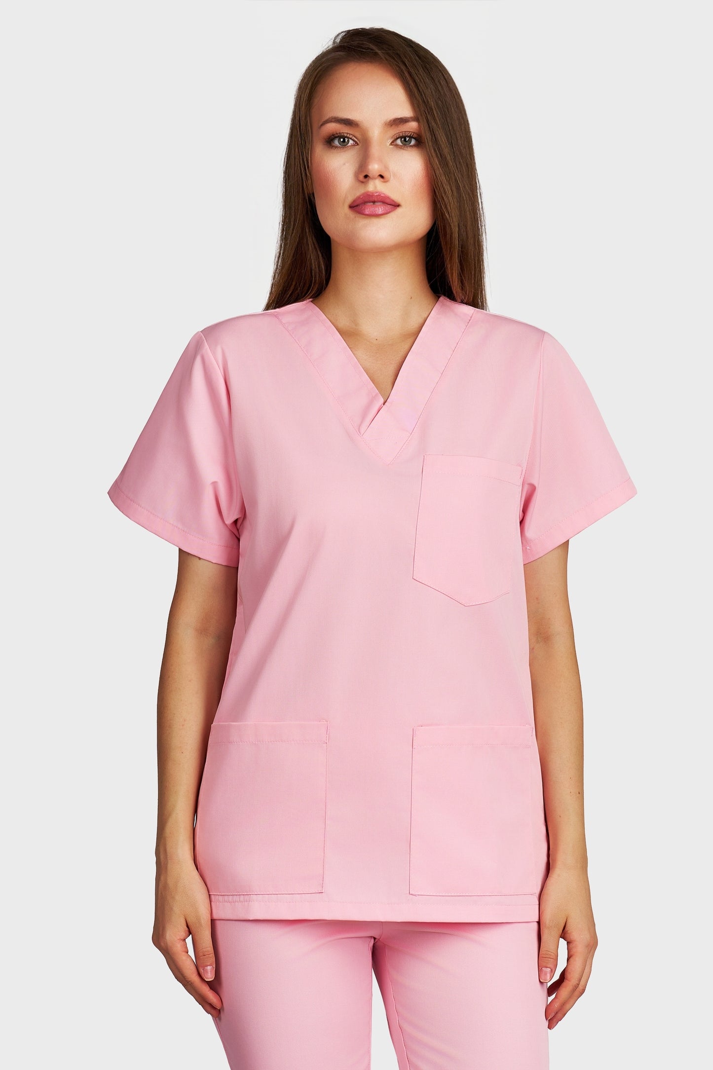 Bluza medicala femei cu guler in V roz - vedere din fata - AKITEX