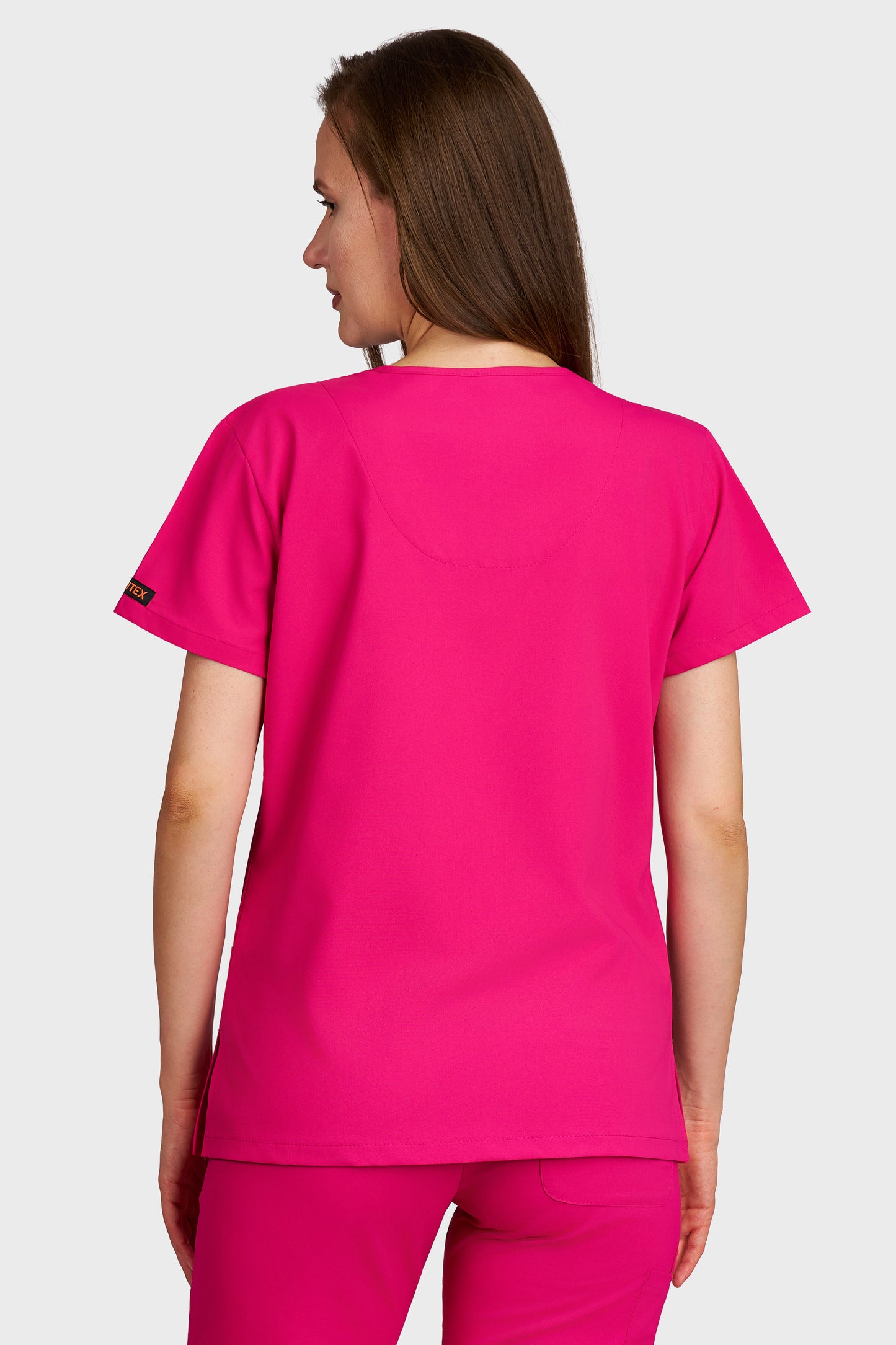 Bluza medicala femei Juliette fucsia stretch - vedere din spate - AKITEX