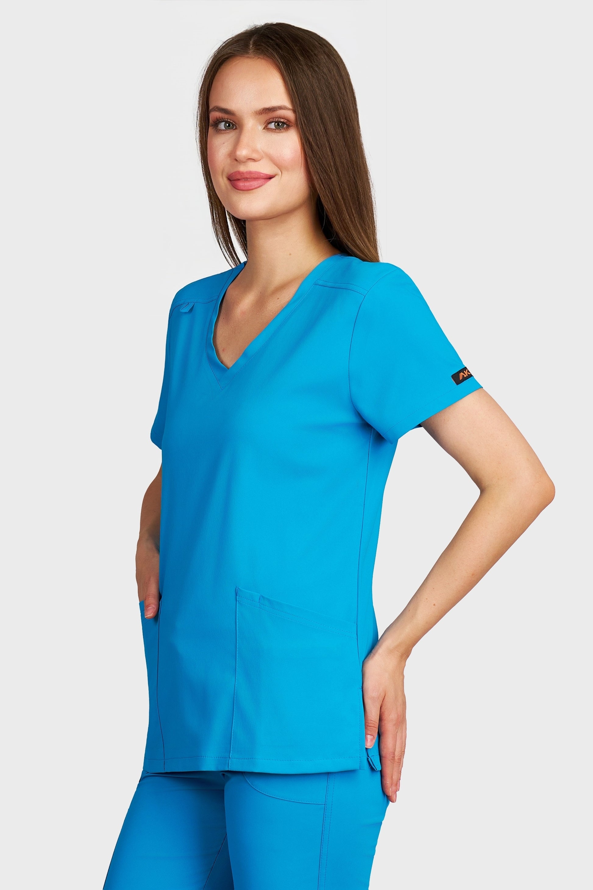 Bluza medicala femei Juliette turcoaz stretch - vedere laterala - AKITEX