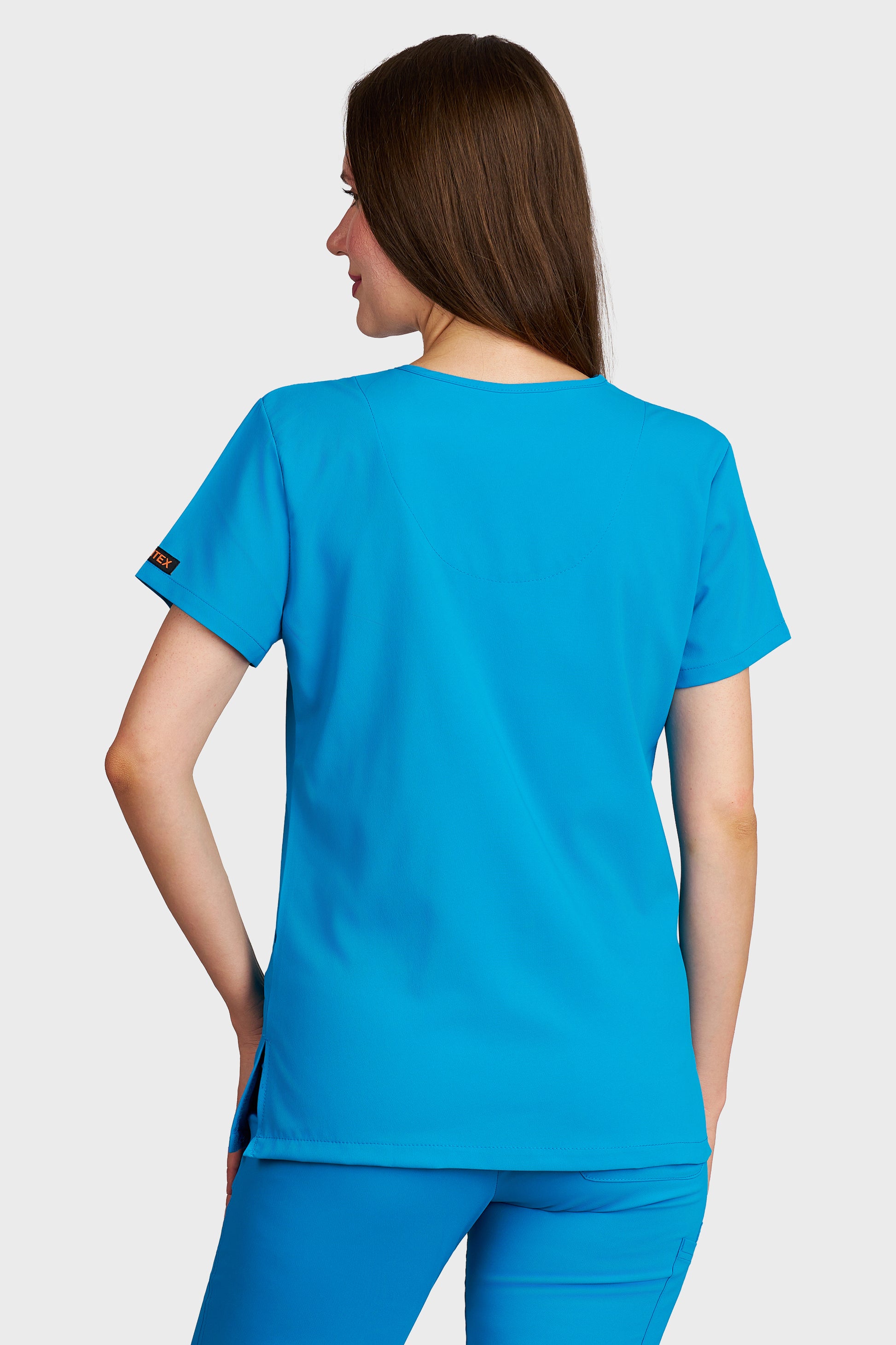 Bluza medicala femei Juliette turcoaz stretch - vedere din spate - AKITEX
