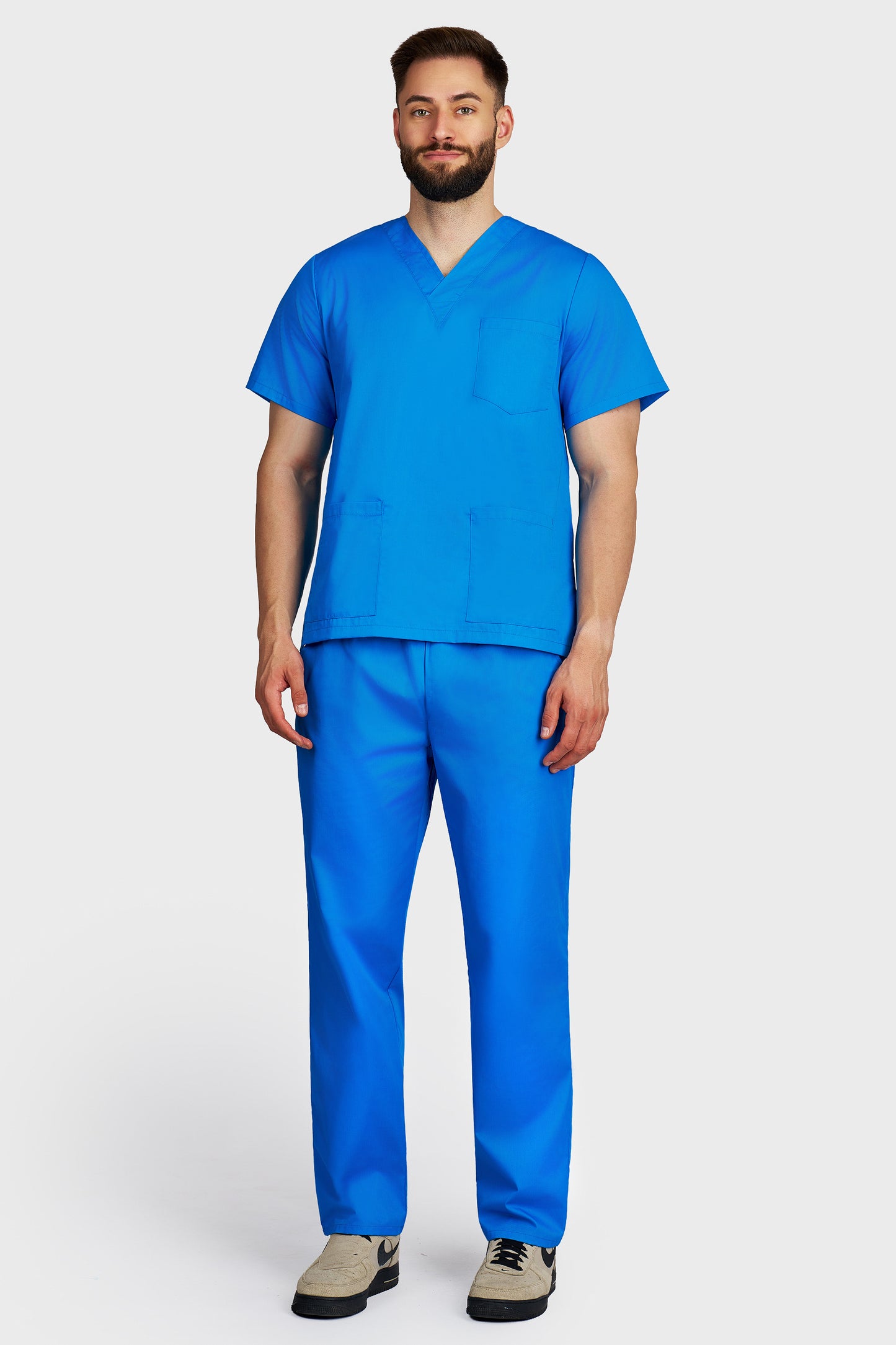 Costum medical barbati turquoise - bluza medicala cu guler in V si pantaloni cu elastic si snur, vedere din fata - AKITEX
