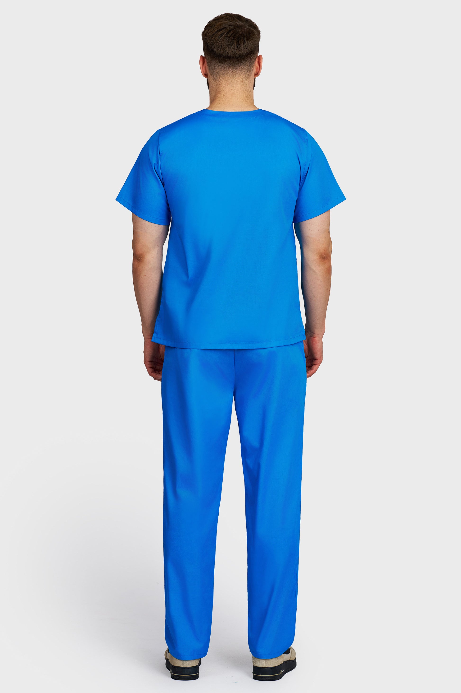 Costum medical barbati turquoise - bluza medicala cu guler in V si pantaloni cu elastic si snur, vedere din spate - AKITEX